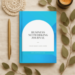 Blue 'Business Networking Journal' on a beige surface with decorative elements