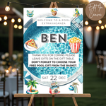 Pool party invitation with pool-themed decorations and food items on a stand.